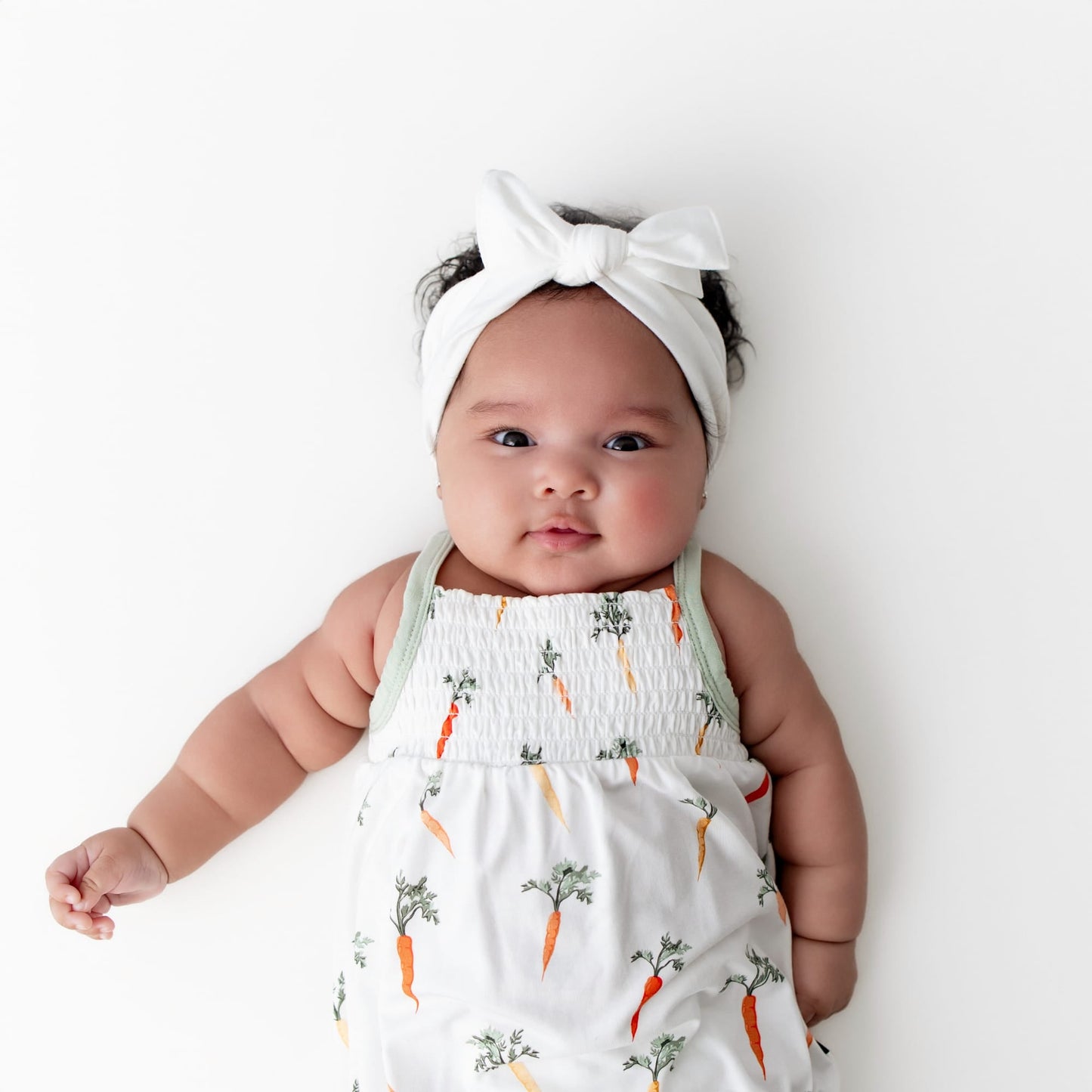 Smocked Bubble Romper in Carrot